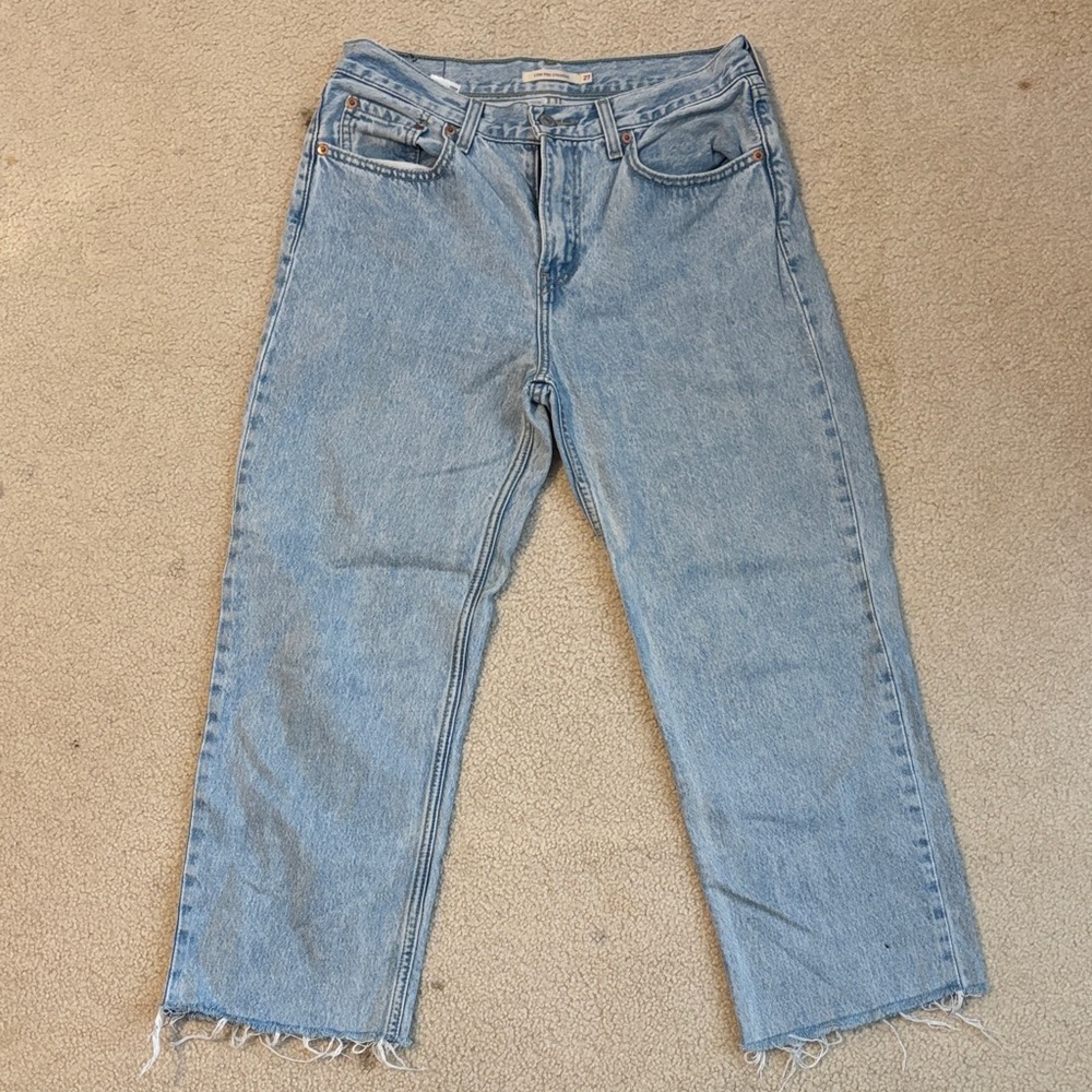 Light Blue Frayed Hem Levi Jeans